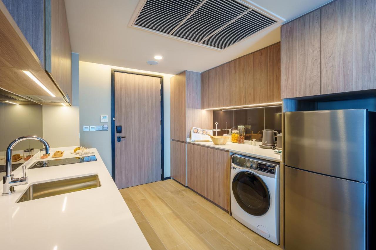 Somerset Pattaya Dış mekan fotoğraf A kitchen in a 3-bedroom unit